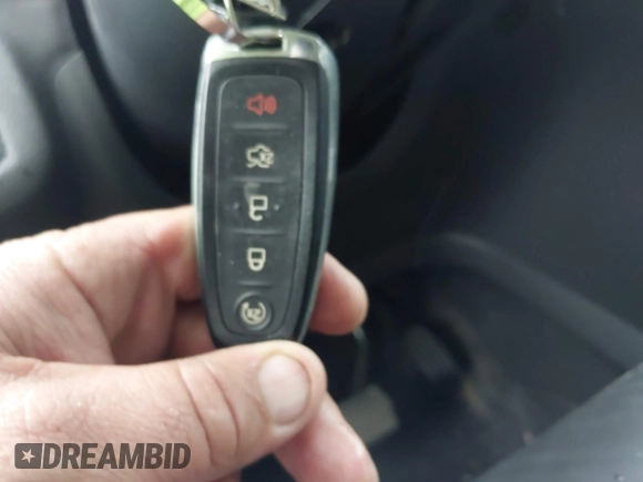 2017 Ford Escape SE with VIN 1FMCU9GD5HUC17297, listed as a IAAI auction lot 41880013 with 57,737 mi miles and . Bid and sale history available at DreamBid. Image 11.