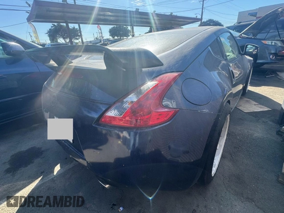 2013 Nissan 370Z with VIN JN1AZ4EH8DM382859, listed as a Copart auction lot 78963274 with 84,190 mi miles and Clean Title. Bid and sale history available at carsss.com. Image 4.