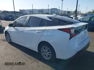 2021 Toyota Prius L Eco with VIN JTDKAMFU0M3149875, listed as a IAAI auction lot 41966010 with 99,542 mi miles. Bid and sale history available at carsss.com. Image 15.