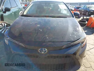 2022 Toyota Corolla Hybrid LE with VIN JTDEAMDE2NJ039206, listed as a IAAI auction lot 41592129 with 97,593 mi miles. Bid and sale history available at carsss.com. Image 12.