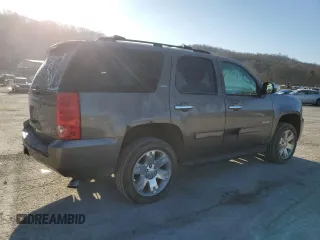 2012 GMC Yukon SLT with VIN 1GKS2CE05CR103674, listed as a Copart auction lot 50557275 with 206,664 mi miles and Salvage Title. Bid and sale history available at carsss.com. Image 3.