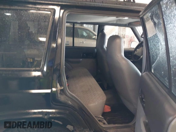 1998 Jeep Cherokee Sport with VIN 1J4FJ68SXWL281659, listed as a IAAI auction lot 42208563 with 203,992 mi miles and . Bid and sale history available at DreamBid. Image 8.