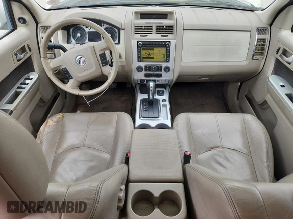 2009 Mercury Mariner Hybrid with VIN 4M2CU29369KJ14719, listed as a Copart auction lot 62511705 with 144,062 mi miles and Salvage title. Bid and sale history available at DreamBid. Image 8.