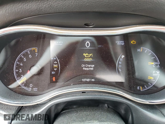 2014 Jeep Grand Cherokee Laredo with VIN 1C4RJEAG2EC179547, listed as a Copart auction lot 53328055 with 107,451 mi miles and Salvage Title. Bid and sale history available at DreamBid. Image 9.