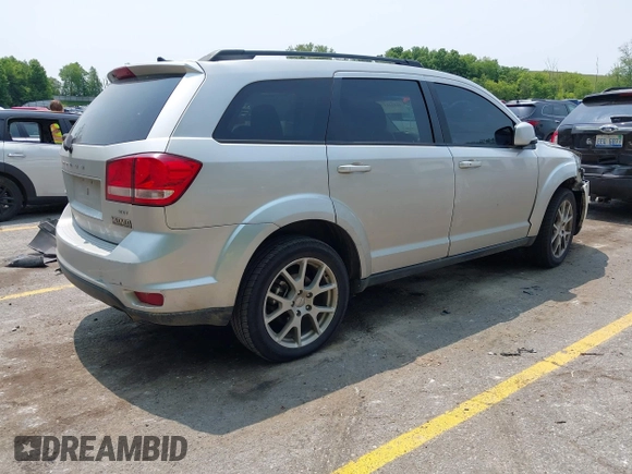 2012 Dodge Journey SXT with VIN 3C4PDDBG1CT249368, listed as a IAAI auction lot 42412217 with 151,680 mi miles and . Bid and sale history available at DreamBid. Image 4.