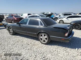 2002 Jaguar XJ with VIN SAJDA15BX2MF47193, listed as a Copart auction lot 49065275 with 69,544 mi miles and Salvage title. Bid and sale history available at DreamBid. Image 2.