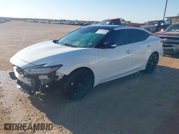2020 Nissan Maxima SR with VIN 1N4AA6EVXLC365710, listed as a IAAI auction lot 40969464 with 74,320 mi miles and . Bid and sale history available at DreamBid. Image 18.