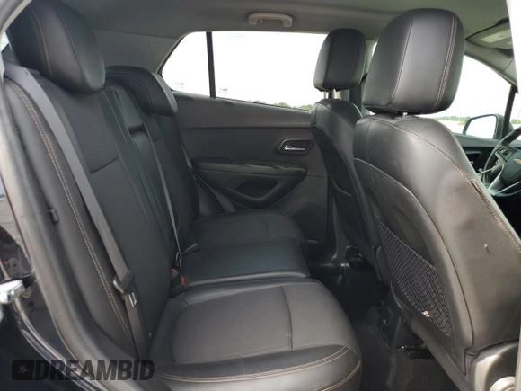 2021 Chevrolet Trax LT z VIN KL7CJLSB8MB356150, wystawiony jako Copart lot #52855555 z przebiegiem 51 781 mil mil oraz Szkoda całkowita • Salvage title. Historia ofert i sprzedaży dostępna na DreamBid. Obrazek 10.