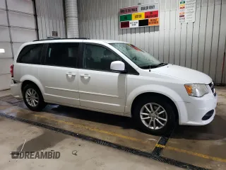 2014 Dodge Grand Caravan SXT z VIN 2C4RDGCGXER138025, wystawiony jako Copart lot #57941985 z przebiegiem 87 055 mil mil oraz Szkody całkowita. Historia ofert i sprzedaży dostępna na DreamBid. Obrazek 4.