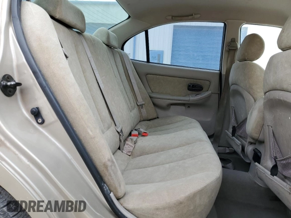 2003 Hyundai Elantra GLS z VIN KMHDN45D23U614630, wystawiony jako Copart lot #85921924 z przebiegiem 182 122 mil mil oraz Szkoda całkowita • Salvage title. Historia ofert i sprzedaży dostępna na DreamBid. Obrazek 10.