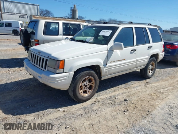 1997 Jeep Grand Cherokee Limited with VIN 1J4GZ78S9VC667698, listed as a IAAI auction lot 41671571 with 191,448 mi miles and . Bid and sale history available at DreamBid. Image 2.
