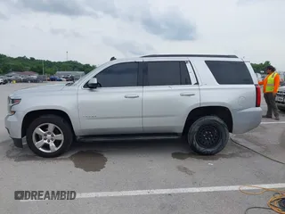 2015 Chevrolet Tahoe LT with VIN 1GNSKBKC3FR224753, listed as a IAAI auction lot 42284497 with 198,943 mi miles and . Bid and sale history available at DreamBid. Image 14.