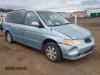 2003 Honda Odyssey EX z VIN 5FNRL186X3B136915, wystawiony jako IAAI lot #42231736 z przebiegiem 129 057 mil mil oraz . Historia ofert i sprzedaży dostępna na DreamBid. Obrazek 1.