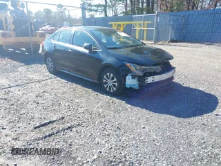 2022 Toyota Corolla Hybrid LE with VIN JTDEAMDE1NJ040248, listed as a IAAI auction lot 41736880 with 72,242 mi miles. Bid and sale history available at carsss.com. Image 1.