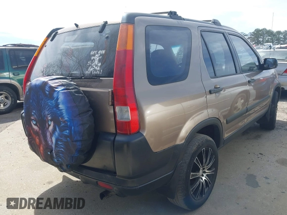 2002 Honda CR-V LX with VIN JHLRD68422C000690, listed as a IAAI auction lot 41829614 with 295,589 mi miles and . Bid and sale history available at carsss.com. Image 4.