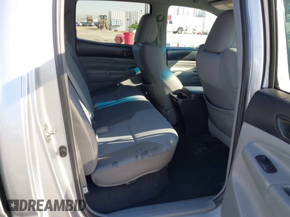 2013 Toyota Tacoma PreRunner with VIN 3TMKU4HN8DM034338, listed as a IAAI auction lot 41808842 with 142,012 mi miles and . Bid and sale history available at DreamBid. Image 8.