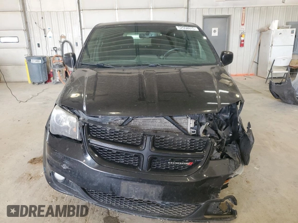 2014 Dodge Grand Caravan SXT 30th Anniversary with VIN 2C4RDGCG1ER200489, listed as a Copart auction lot 52558915 with 127,035 mi miles and Salvage Title. Bid and sale history available at DreamBid. Image 5.