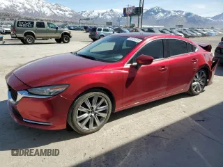 2021 Mazda 6 Carbon Edition with VIN JM1GL1WY8M1605828, listed as a Copart auction lot 48435225 with 70,917 mi miles and Salvage Title. Bid and sale history available at DreamBid. Image 1.