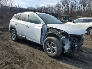 2022 Hyundai Tucson SEL with VIN 5NMJBCAE0NH027913, listed as a Copart auction lot 47072315 with 56,881 mi miles and Salvage Title. Bid and sale history available at carsss.com. Image 4.