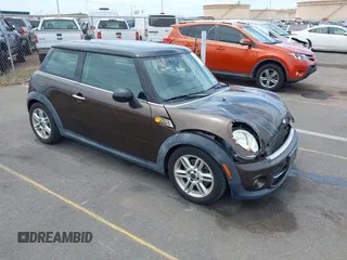 2012 MINI Hardtop with VIN WMWSU3C58CT261401, listed as a IAAI auction lot 42191548 with 96,115 mi miles and . Bid and sale history available at DreamBid. Image 1.