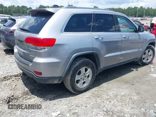 2016 Jeep Grand Cherokee 75th Anniversary with VIN 1C4RJEAG4GC391059, listed as a IAAI auction lot 42485892 with 160,000 mi miles and . Bid and sale history available at DreamBid. Image 4.