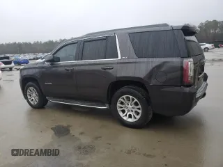 2015 GMC Yukon SLT with VIN 1GKS1BKC9FR278056, listed as a Copart auction lot 44989505 with 205,885 mi miles and Salvage Title. Bid and sale history available at carsss.com. Image 2.