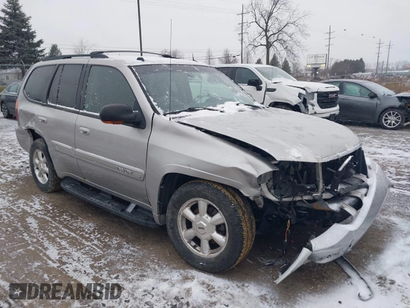 2005 GMC Envoy SLT with VIN 1GKDT13S352258640, listed as a IAAI auction lot 41226997 with 159,665 mi miles. Bid and sale history available at carsss.com. Image 1.