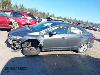 2013 Honda Civic LX with VIN 2HGFB2F52DH596556, listed as a IAAI auction lot 42054070 with 129,721 mi miles and . Bid and sale history available at DreamBid. Image 15.