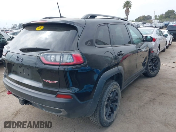 2019 Jeep Cherokee Trailhawk with VIN 1C4PJMBX6KD232515, listed as a IAAI auction lot 39495367 with 53,293 mi miles and . Bid and sale history available at DreamBid. Image 4.