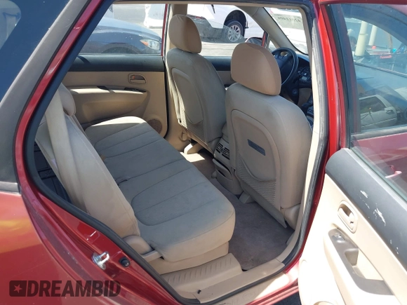 2008 Kia Rondo EX with VIN KNAFG525387174835, listed as a IAAI auction lot 42011406 with 138,656 mi miles. Bid and sale history available at carsss.com. Image 8.