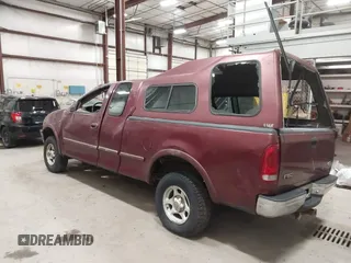 1997 Ford F-150 XL with VIN 1FTEX18L3VKC91921, listed as a IAAI auction lot 41820453 with 210,553 mi miles. Bid and sale history available at carsss.com. Image 3.