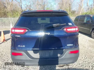 2015 Jeep Cherokee Latitude with VIN 1C4PJMCB1FW709560, listed as a IAAI auction lot 42035619 with 162,354 mi miles. Bid and sale history available at carsss.com. Image 16.
