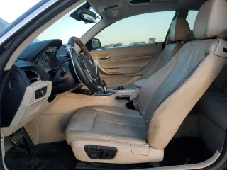 2014 BMW 2 Series 228i with VIN WBA1F5C54EVV99497, listed as a Copart auction lot 42703515 with 135,719 mi miles and Salvage Title. Bid and sale history available at DreamBid. Image 7.