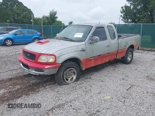 1997 Ford F-150 XL with VIN 1FTDX1869VNA33231, listed as a IAAI auction lot 42697823 with 149,986 mi miles and . Bid and sale history available at DreamBid. Image 2.