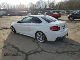 2015 BMW 2 Series M235i xDrive with VIN WBA1J9C55FVX98646, listed as a Copart auction lot 86187464 with 0 mi miles and Salvage Title. Bid and sale history available at carsss.com. Image 2.