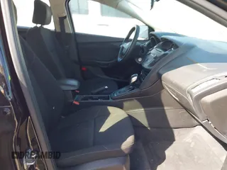 2016 Ford Focus SE with VIN 1FADP3FE7GL202284, listed as a IAAI auction lot 42014457 with 130,000 mi miles. Bid and sale history available at carsss.com. Image 5.
