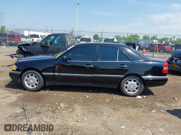 1997 Mercedes-Benz C z VIN WDBHA23E7VF501943, wystawiony jako IAAI lot #42275734 z przebiegiem Nie podano mil oraz . Historia ofert i sprzedaży dostępna na DreamBid. Obrazek 14.