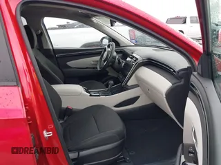2022 Hyundai Tucson SEL with VIN 5NMJF3AE2NH115088, listed as a IAAI auction lot 41915800 with 13,120 mi miles and . Bid and sale history available at DreamBid. Image 5.