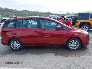2012 Mazda 5 Sport with VIN JM1CW2BL9C0107471, listed as a IAAI auction lot 42021285 with 104,851 mi miles. Bid and sale history available at carsss.com. Image 13.