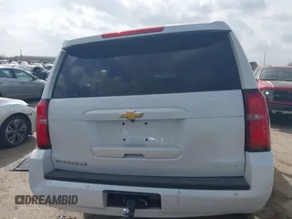 2016 Chevrolet Suburban LT with VIN 1GNSCHKC9GR273201, listed as a IAAI auction lot 41743971 with 180,945 mi miles. Bid and sale history available at carsss.com. Image 16.
