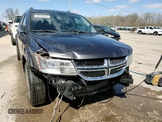 2014 Dodge Journey Limited with VIN 3C4PDDDG4ET202173, listed as a Copart auction lot 52020835 with 124,624 mi miles and Salvage Title. Bid and sale history available at carsss.com. Image 14.