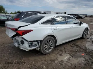 2022 Toyota Avalon XLE z VIN 4T1JZ1FB0NU086057, wystawiony jako Copart lot #56492205 z przebiegiem 22 869 mil mil oraz Szkoda całkowita • Salvage title. Historia ofert i sprzedaży dostępna na DreamBid. Obrazek 3.
