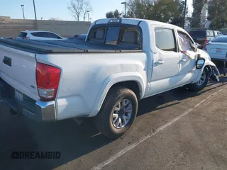 2017 Toyota Tacoma SR5 with VIN 3TMAZ5CN8HM040978, listed as a IAAI auction lot 41847492 with 103,731 mi miles and . Bid and sale history available at DreamBid. Image 4.