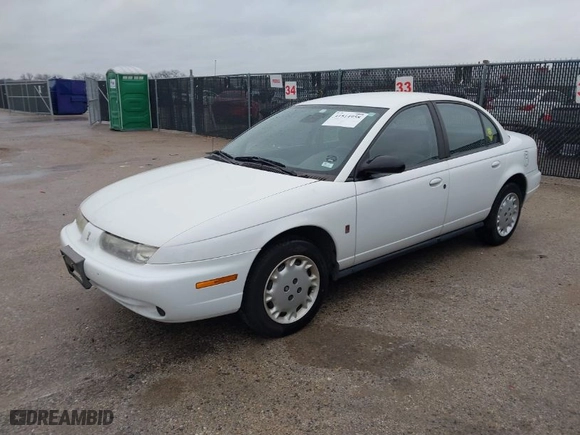 1997 Saturn SL with VIN 1G8ZK5274VZ196952, listed as a IAAI auction lot 41514958 with 125,683 mi miles. Bid and sale history available at carsss.com. Image 2.