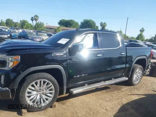 2019 GMC Sierra 1500 Denali z VIN 1GTU9FEL8KZ173809, wystawiony jako IAAI lot #42363300 z przebiegiem 75 425 mil mil oraz . Historia ofert i sprzedaży dostępna na DreamBid. Obrazek 15.