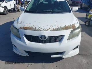 2010 Toyota Corolla with VIN 1NXBU4EEXAZ218218, listed as a IAAI auction lot 41967629 with 228,754 mi miles. Bid and sale history available at carsss.com. Image 12.