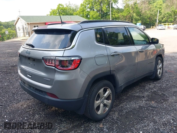 2018 Jeep Compass Latitude with VIN 3C4NJDBB8JT434339, listed as a IAAI auction lot 42404248 with 131,295 mi miles and . Bid and sale history available at DreamBid. Image 4.