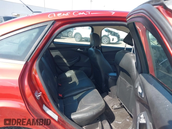 2018 Ford Focus Titanium with VIN 1FADP3J20JL281141, listed as a IAAI auction lot 42437424 with 113,499 mi miles and . Bid and sale history available at DreamBid. Image 8.