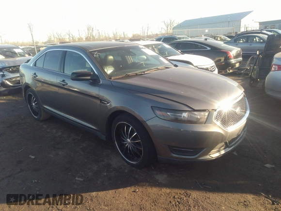 2014 Ford Taurus SHO with VIN 1FAHP2KT4EG140364, listed as a IAAI auction lot 35451709 with 82,904 mi miles. Bid and sale history available at carsss.com. Image 1.