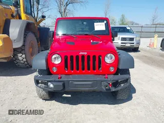 2015 Jeep Wrangler Unlimited Rubicon Hard Rock with VIN 1C4HJWFG9FL525556, listed as a IAAI auction lot 41973576 with 246,949 mi miles and . Bid and sale history available at DreamBid. Image 12.